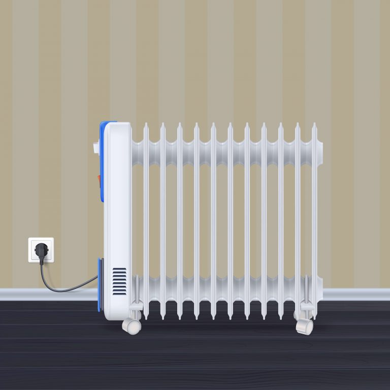 Ein elektrischer Radiator oder Konvektor sorgt für warme Luft in einem Raum.