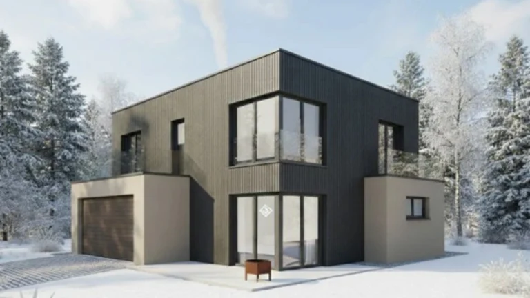 Ein modernes anthrazitfarbenes Haus mit Flachdach auf einem verschneiten Grundstück.