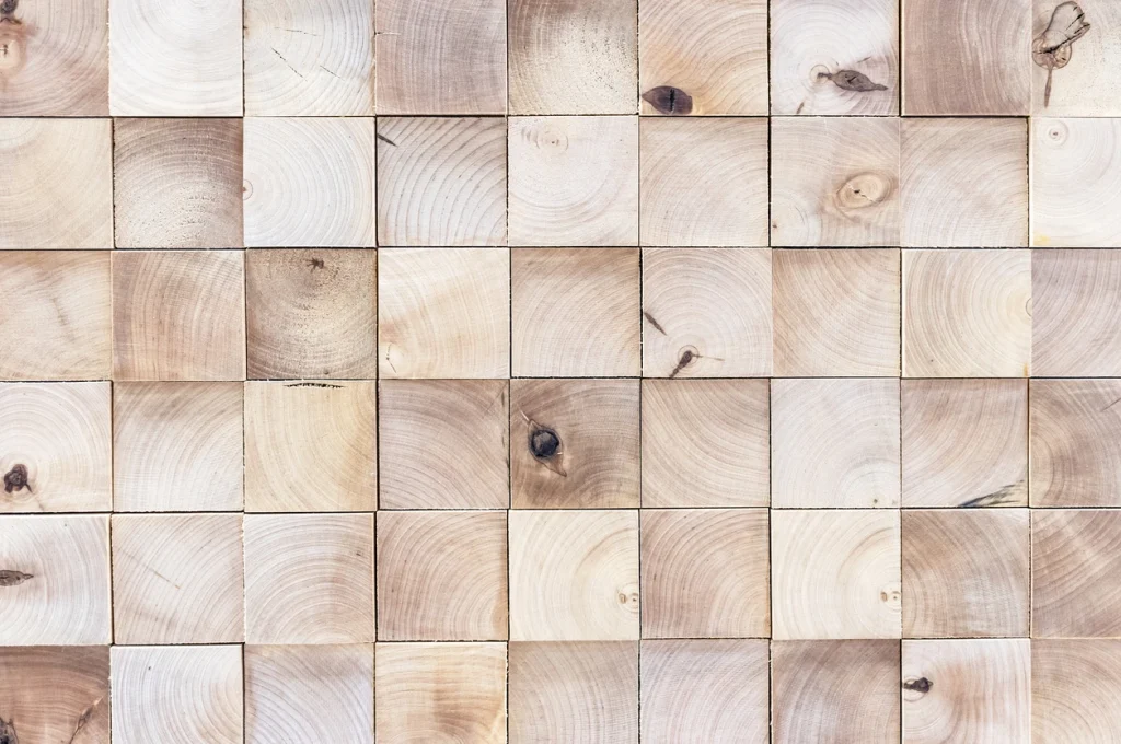 Hoch belastbares Holzpflaster mit sichtbarer Hirnholz-Struktur für Werkstatt oder Wohnraum.